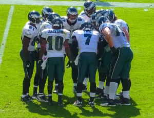 Desean Jackson (number 10) in a team huddle. Photo by Matthew Straubmuller Used under Creative Commons License