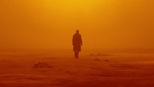 Photo of Ryan Gosling in desert.