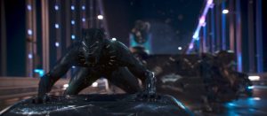 Black Panther on top of a moving car