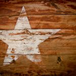 Texas star painted on a wooden wall.