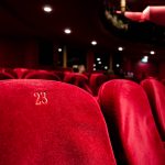 Red, velvet seats at a theater