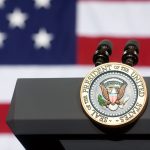 Presidential seal on a podium