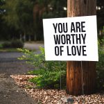 Sign that says "You are worthy of love"