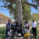 Nine McNair Scholars pictured outside on a campus tour at the University of Southern California
