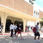 students exiting chapel-final