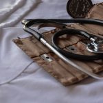Black stethoscope with leather bag