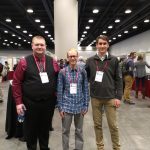 Jackson, Phillip, and Dr. Hoekman at the conference
