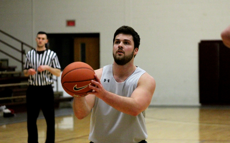 A student shooting another free throw