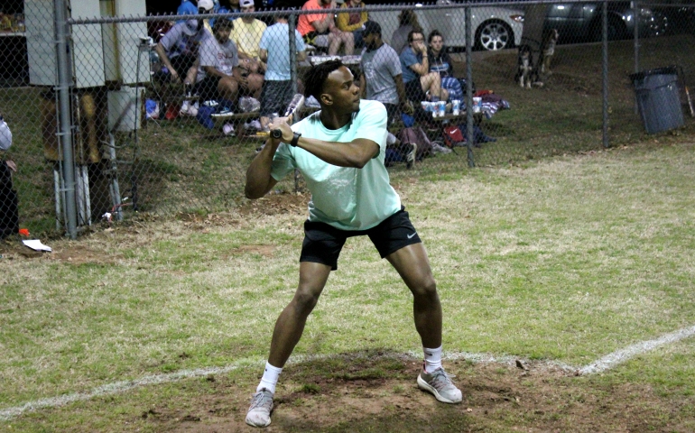 A student hitting the ball